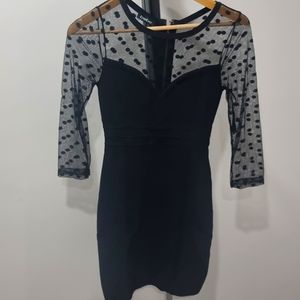 Bebe bandage sheer neck and sleeves , bodycon dress (size XS) black colour
